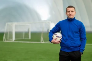 medium shot man holding ball 1024x683 medium shot man holding ball 1024x683